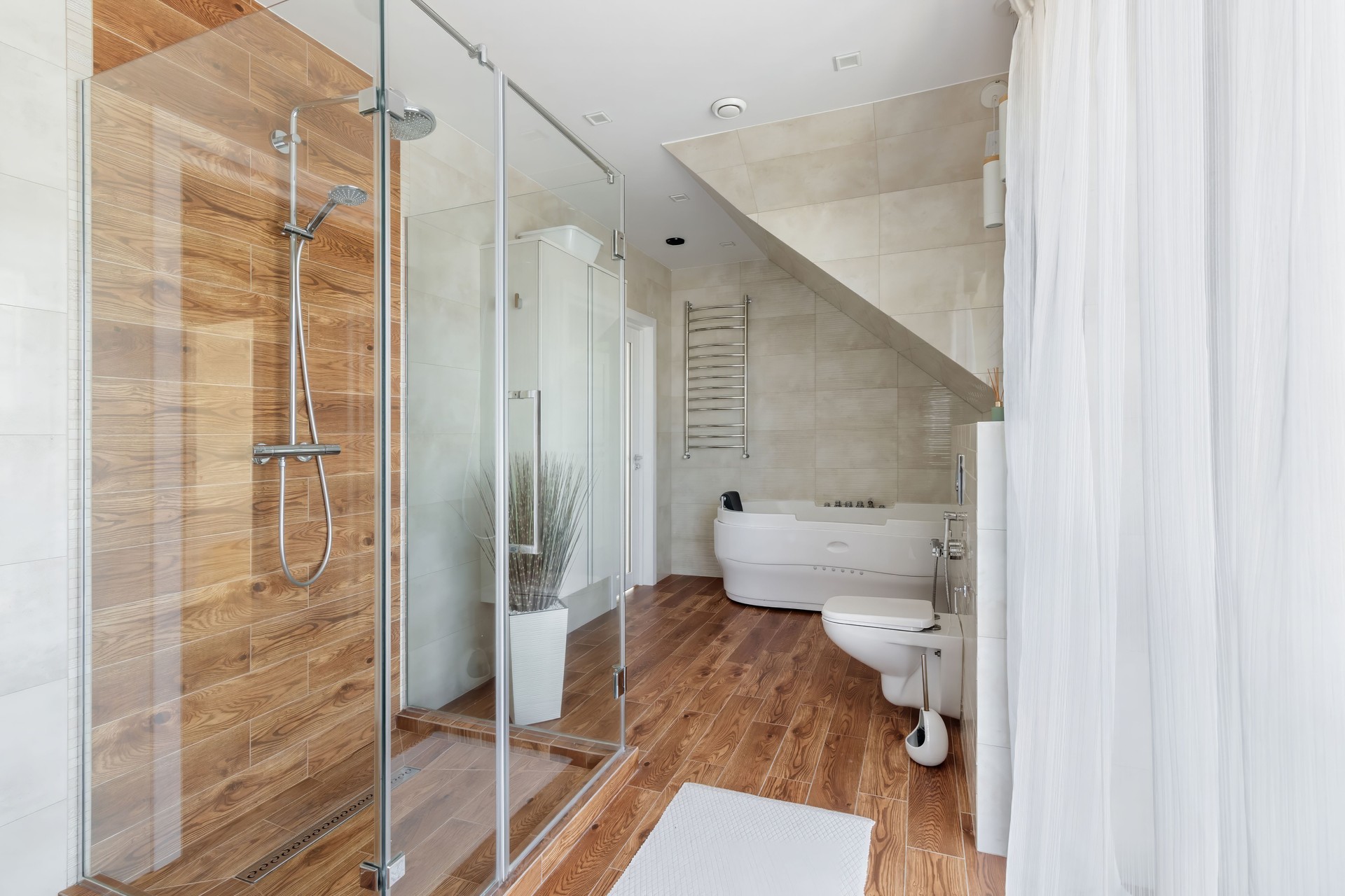 Modern Bathroom with Wooden Floor and Elegant Fixtures